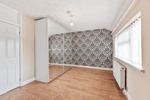 Bedroom One- click for photo gallery